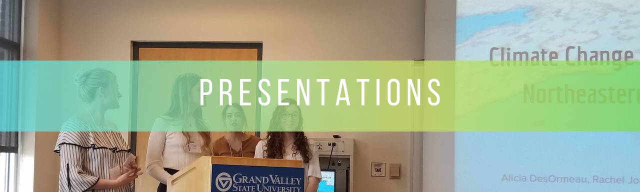"Presentations": Picture of four girls behind a pedestal presenting their work